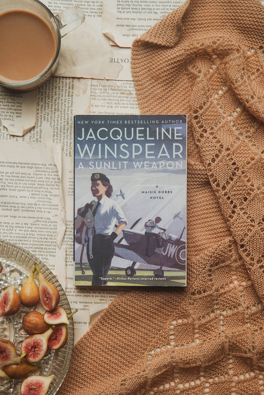 A Sunlit Weapon by Jacqueline Winspear
