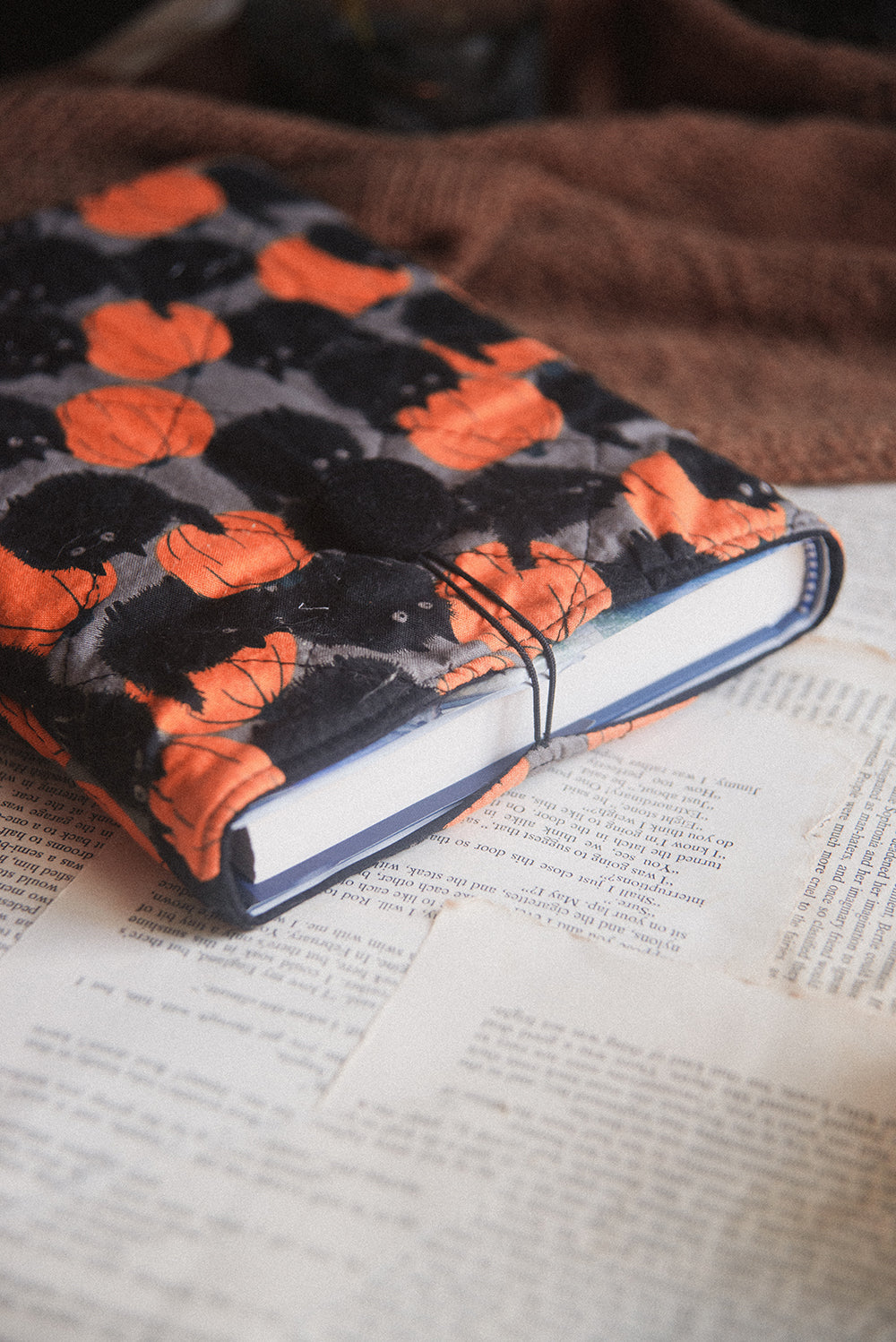 Black Puff Cat Book Sleeve