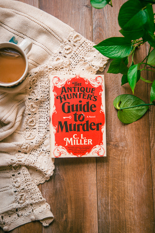 The Antique Hunter's Guide to Murder by C.L. Miller